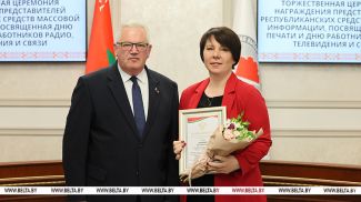 Igor Karpenko, Chairman of the Central Election Commission, and Yelena Krutolevich, Editor-in-Chief of BelTA's main news desk