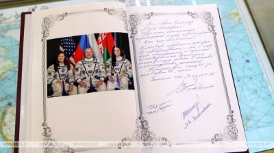 Vasilevskaya signs Visitors’ Book at Baikonur museum
  
 