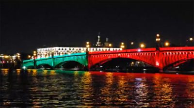 Trinity Bridge in St. Petersburg lit up in Belarusian colors