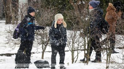Kids enjoy first snowfall of the season in Minsk