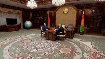 Lukashenko receives report from Sergeyenko